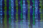Stocks slip as markets await Trump's Hong Kong response