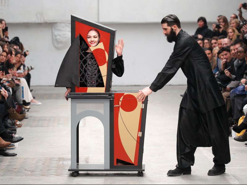 &copy; Reuters/Benoit Tessier, A magician performs with a model who presents a creation by Indian designer Manish Arora as part of his Fall-Winter 2011/2012 women&#039;s ready-to-wear fashion collection during Paris Fashion Week.