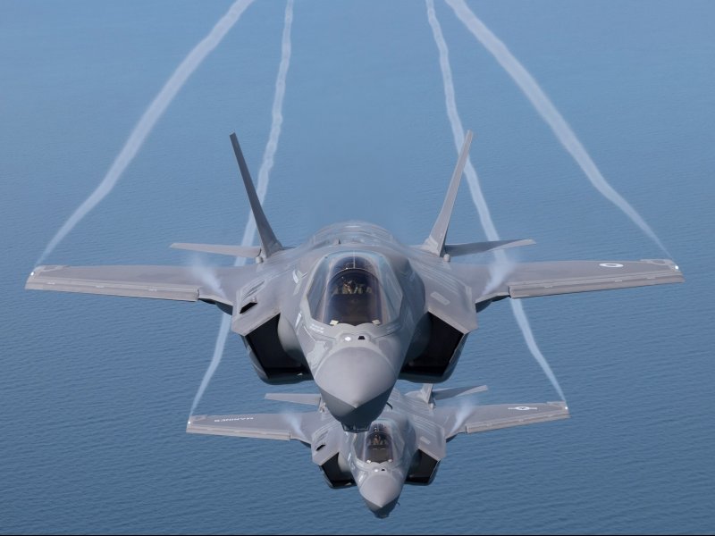 &copy; Matt Cardy/Getty Images, The first of Britain&#039;s new supersonic &#039;stealth&#039; strike fighters accompanied by a United States Marine Corps F-35B aircraft, flies over the North Sea.