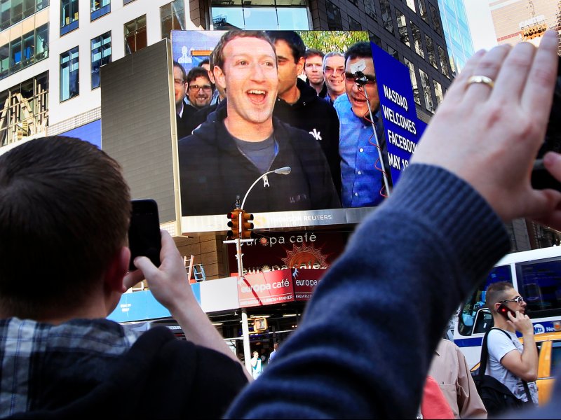 &copy; Shannon Stapleton/Reuters, Facebook Inc. CEO Mark Zuckerberg is seen on a screen televised from their headquarters in Menlo Park moments after their IPO launch in New York May 18, 2012.