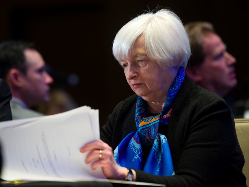 © Cliff Owen/AP, Federal Reserve Chair Janet Yellen waiting to speak at the Federal Reserve System Community Development Research Conference in Washington on March 23.