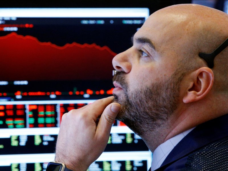 &copy; Reuters, A trader on the floor of the New York Stock Exchange on Monday.