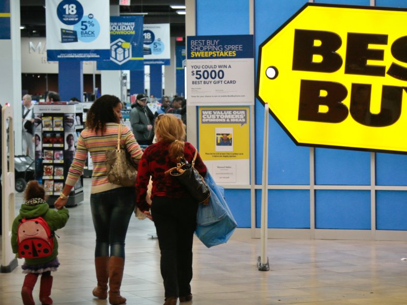 &copy; Associated Press/Bebeto Matthews, In this Nov. 23, 2013, file photo, shoppers enter a Best Buy in New York.