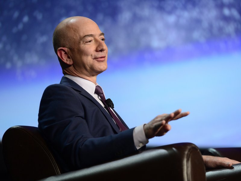 &copy; Brent Lewis/The Denver Post via Getty Images, Founder of space company Blue Origin, Jeff Bezos, speaks about the future of commercial space travel during the 32nd Space Symposium on April 12, 2016 in Colorado Springs, Colorado.