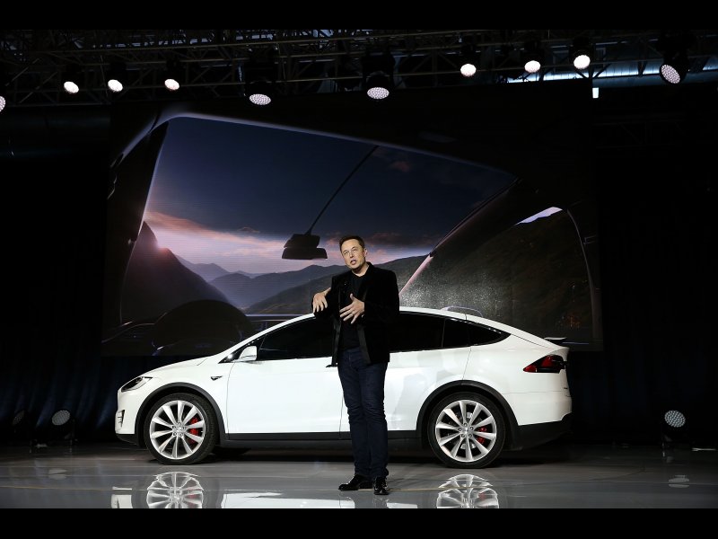 &copy; Justin Sullivan/Getty Images, Tesla CEO Elon Musk speaks during an event to launch the new Tesla Model X Crossover SUV on September 29, 2015 in Fremont, California.