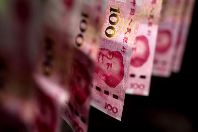 China's Yuan Suddenly Retreats the Most in Three Weeks