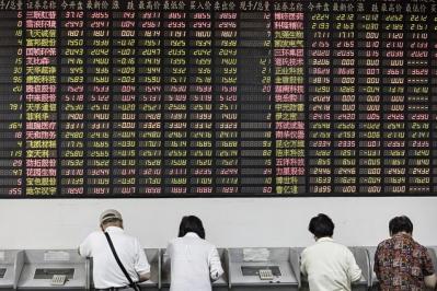 Nhà đầu tư Trung Quốc bị cấm giao dịch hàng chục cổ phiếu nước ngoài