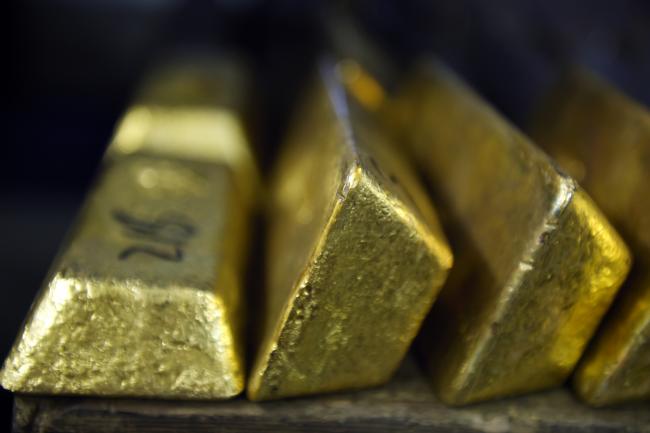 © Bloomberg. Gold bars sit in a vault at the Perth Mint Refinery, operated by Gold Corp., in Perth, Australia, on Thursday, Aug. 9, 2018.