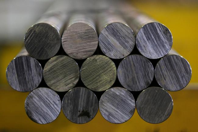 © Bloomberg. Lengths of rolled steel rods sit in storage ahead of distribution at the Oskol Elektrometallurgical Plant (OEMK) steel mill, operated by Metalloinvest Holding Co., in Stary Oskol, Russia, July 14, 2017. The new hot briquetted iron (HBI) production line at the Lebedinsky mine in Russia has an output capacity of 1.8m tons per year, a spokeswoman said by phone.