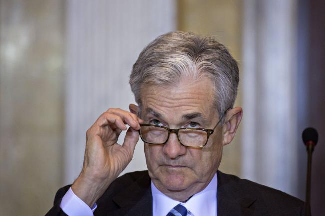 © Bloomberg. Jerome Powell, chairman of the U.S. Federal Reserve, removes his glasses during a Financial Stability Oversight Council (FSOC) meeting at the U.S. Treasury in Washington, D.C., U.S., on Tuesday, Oct. 16, 2018. Powell said at the meeting he is worried about a spillover from hard Brexit, but stocks and Treasuries showed little reaction. Photographer: Andrew Harrer/Bloomberg