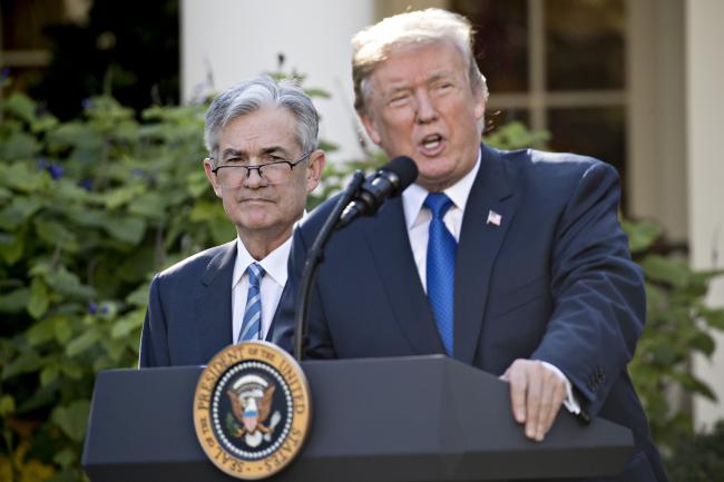 © Bloomberg. U.S. President Donald Trump speaks as Jerome Powell, governor of the U.S. Federal Reserve and Trumps nominee as chairman of the Federal Reserve, left, listens during a nomination announcement in the Rose Garden of the White House in Washington, D.C., U.S., on Thursday, Nov. 2, 2017. If approved by the Senate, the 64-year-old former Carlyle Group LP managing director and ex-Treasury undersecretary would succeed Fed Chair Janet Yellen.