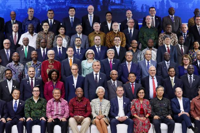 © Bloomberg. Finance ministers and central bank's governors during the family photo session at the IMF and World Bank Group Annual Meetings in Bali on Oct. 13, 2018. Photographer: SeongJoon Cho/Bloomberg