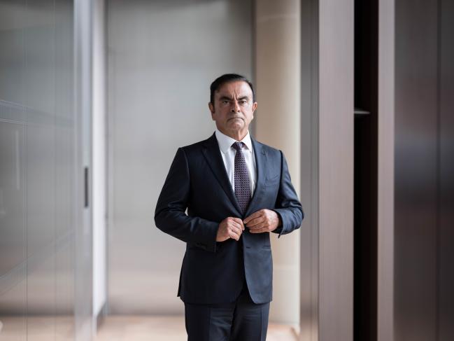 © Bloomberg. Carlos Ghosn, chairman of the alliance between Renault SA, Nissan Motor Co. and Mitsubishi Motors Corp., poses for a photograph ahead of a Bloomberg Television interview in London, U.K., on Wednesday, Sept. 12, 2018. Ghosn is the chairman of the alliance and all the three member companies, and also the chief executive officer of Renault. Photographer: Simon Dawson/Bloomberg