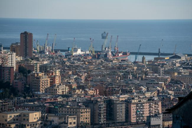 © Bloomberg. Container ships sit in the port at Genoa, Italy, on Friday, Feb. 8, 2019. Italian industrial production fell for a fourth straight month, in a sign the recession that started late last year may persist. Photographer: Federico Bernini/Bloomberg