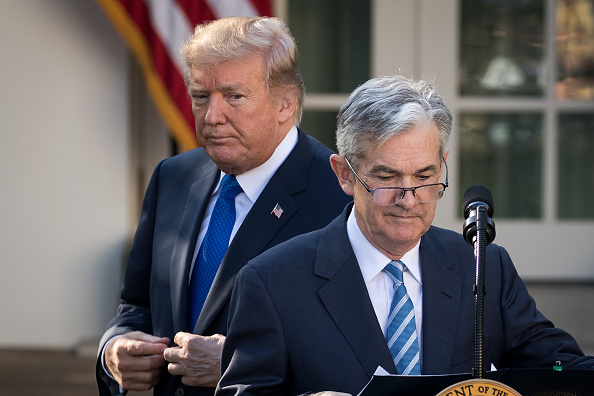 © Bloomberg. WASHINGTON, DC - NOVEMBER 02: (L to R) U.S. President Donald Trump looks on as his nominee for the chairman of the Federal Reserve Jerome Powell takes to the podium during a press event in the Rose Garden at the White House, November 2, 2017 in Washington, DC. Current Federal Reserve chair Janet Yellen's term expires in February. (Photo by Drew Angerer/Getty Images)