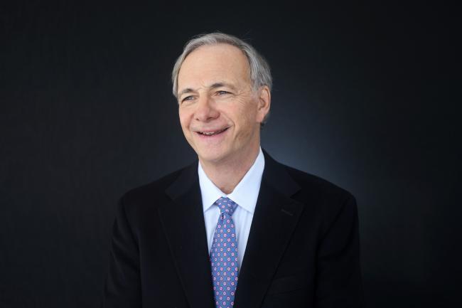 © Bloomberg. Raymond Dalio, billionaire and founder of Bridgewater Associates LP, poses for a photograph following a Bloomberg Television interview at the World Economic Forum (WEF) in Davos, Switzerland, on Thursday, Jan. 19, 2017. World leaders, influential executives, bankers and policy makers attend the 47th annual meeting of the World Economic Forum in Davos from Jan. 17 - 20.