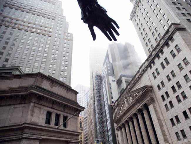 © Bloomberg. The New York Stock Exchange (NYSE) stands in New York, U.S., on Wednesday, April 25, 2018. Amazon.com Inc. and Google parent Alphabet Inc. won't trade for the rest of the day at the New York Stock Exchange, which is not a scary prospect because they're listed by Nasdaq Inc. and seem to be trading just fine there and on other markets. Photographer: Michael Nagle/Bloomberg