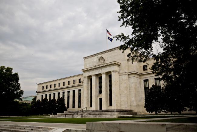 Fed Signals High Bar for Rate Move While Iran Tensions Simmer