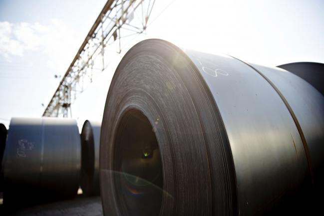 © Bloomberg. Steel coils sit outside at the U.S. Steel Corp. Granite City Works facility in Granite City, Illinois, U.S. Photographer: Daniel Acker/Bloomberg