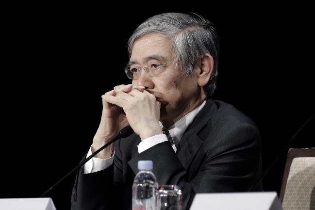 © Bloomberg. Haruhiko Kuroda, governor of the Bank of Japan (BOJ), attends the Paris Europlace International Financial Forum in Tokyo, Japan, on Monday, Nov. 19, 2018. Kuroda said banks need to adjust business model for aging challenges and policy makers need to be mindful of possible consequences from any weakening of the financial system as demographics put downward pressure on banking sector profits. Photographer: Kiyoshi Ota/Bloomberg