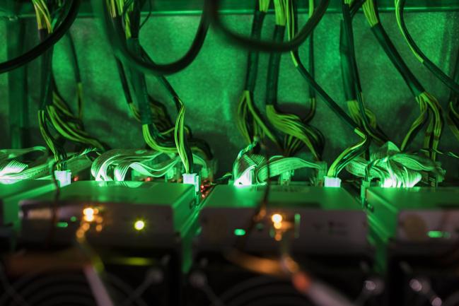 © Bloomberg. Cryptocurrency mining rigs operate in a cargo container at the Golden Fleece cryptocurrency mining company in Kutaisi, Georgia. Bloomberg Bloomberg Bloomberg Bloomberg