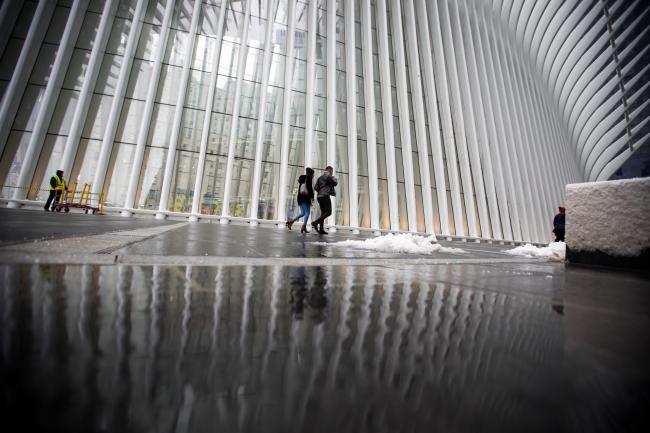 © Bloomberg. Pedestrians pass in front of the Oculus transportation hub in New York. Photographer: Michael Nagle/Bloomberg