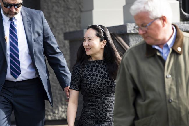 © Bloomberg. Meng Wanzhou leaves her house for a hearing at the Supreme Court in Vancouver on May 7, 2019. Photographer: Jimmy Jeong/Bloomberg