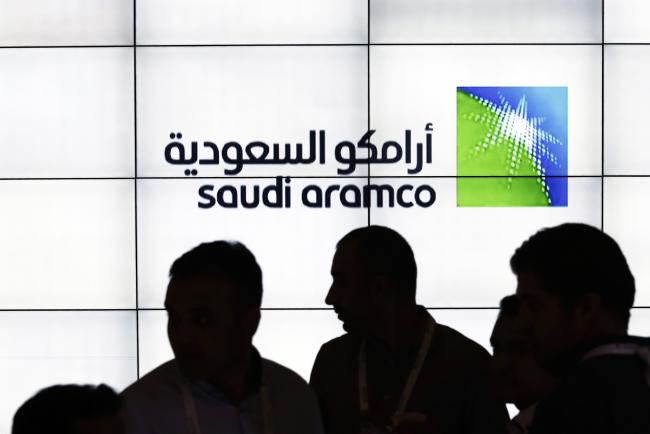 © Bloomberg. A Saudi Arabian Oil Co. (Aramco) logo sits on an electronic display at the company's corporate pavilion during the 22nd World Petroleum Congress in Istanbul, Turkey, on Wednesday, July 12, 2017.  