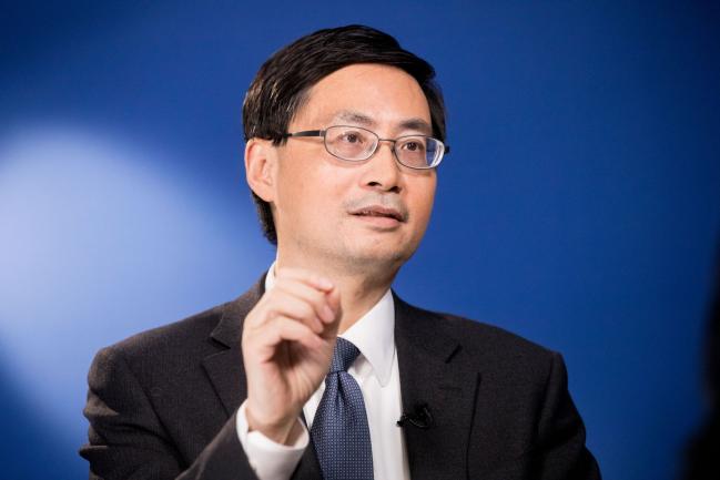 China Central Bank Adviser Warns on Debt Chain Reaction