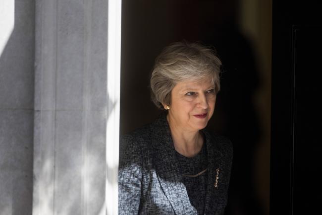 © Bloomberg. Theresa May, U.K. prime minister, leaves number 10 Downing Street to greet Qatar’s Emir Sheikh Tamim bin Hamad Al Thani, in London, U.K., on Tuesday, July 24, 2018.