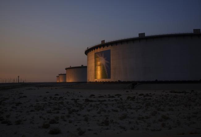 © Bloomberg. A logo sits on display outside an oil storage tank in the Juaymah tank farm at Saudi Aramco's Ras Tanura oil refinery and terminal at Ras Tanura, Saudi Arabia, on Monday, Oct. 1, 2018. Speculation is rising over whether Saudi Arabia will break with decades-old policy by using oil as a political weapon, as it vowed to hit back against any punitive measures after the disappearance of government critic Jamal Khashoggi. 