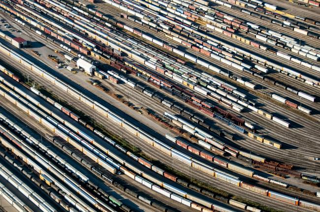 © Bloomberg. Freight trains and oil tankers sit in a rail yard in this aerial photograph taken above Toronto, Ontario, Canada, on Monday, Oct. 2, 2017.