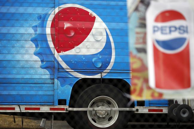 © Bloomberg. Signage is seen on the side of a delivery truck outside the Pepsi Beverages Co. plant in Louisville, Kentucky, U.S., on Sunday, Feb. 11, 2018. PepsiCo Inc. is scheduled to release earnings figures on February 13. Photographer: Luke Sharrett/Bloomberg