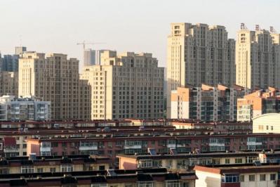 Giá nhà ở Trung Quốc tăng trưởng yếu nhất trong 10 tháng