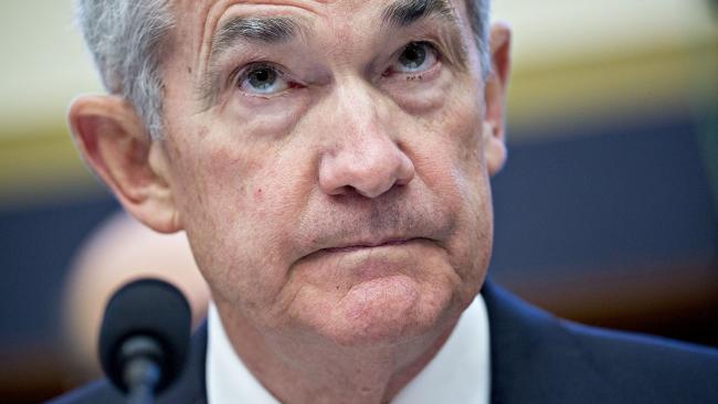 © Bloomberg. Jerome Powell, chairman of the U.S. Federal Reserve, listens during a House Financial Services Committee hearing in Washington, D.C., U.S., on Tuesday, Feb. 27, 2018. Powell said the central bank can continue gradually raising interest rates as the outlook for growth remains strong, and the recent bout of financial volatility shouldn\\'t weigh on the U.S. economy. 