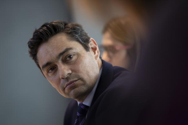 © Bloomberg. Carlos Alfredo Vecchio, charge d’affaires of Venezuela by National Assembly leader Juan Guaido, listens during an interview in Washington, D.C., U.S., on Monday, Feb. 4, 2019. The European Union's recognition of Guaido gives the opposition strong momentum but more pressure will help end usurpation of power in Venezuela, Vecchio said. Photographer: Al Drago/Bloomberg