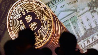Bitcoin vượt mốc 9,000 USD