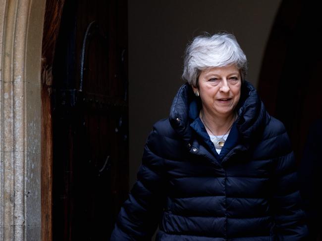 © Bloomberg. SONNING, ENGLAND - MAY 05: British Prime Minister Theresa May and her husband Philip leave after attending a Sunday service at her local church on May 5, 2019 in Sonning, England. Theresa May has called for Labour Party leader Jeremy Corbyn to put their differences aside and agree a Brexit deal. (Photo by Chris J Ratcliffe/Getty Images)