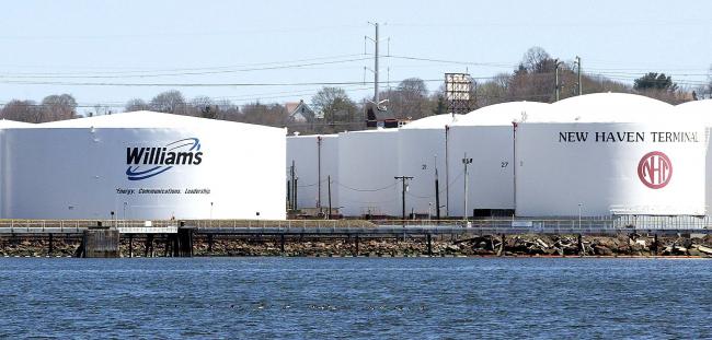 © Bloomberg. Natural-gas storage tanks at the Williams Energy Partners terminal at New Haven, Connecticut, are pictured on Monday, April 21, 2003.  