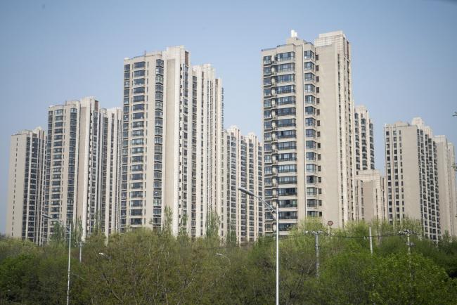 China’s Home-Price Growth Slows for Third Month as Curbs Bite