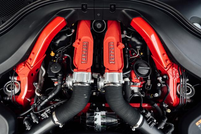 © Bloomberg. The 3.9-liter V8 engine is seen in the Ferrari Portofino vehicle in New York, U.S., on Thursday, Aug. 16, 2018. The Portofino is the replacement to the humble California T, which debuted 10 years ago and has since become Ferrari's all-time best-seller. 