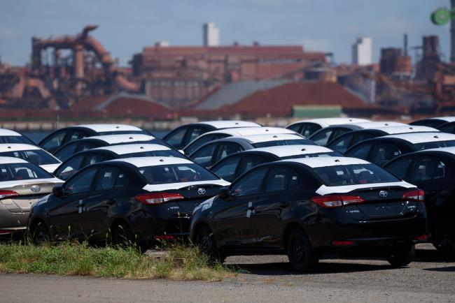 © Bloomberg. Toyota Motor Corp. Yaris vehicles bound for shipment stand at the Nagoya Port in Nagoya, Japan, on Tuesday, July 31, 2018. Japan is scheduled to release trade balance figures for July on Aug. 16. 