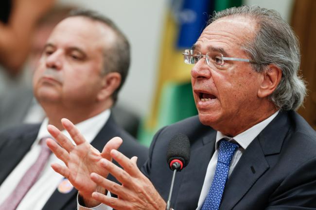 © Bloomberg. Paulo Guedes, Brazil's economy minister, speaks during a public hearing on pension reform before the Lower House Justice and Constitution Committee in Brasilia, Brazil, on Wednesday, April 3, 2019. Guedes sparred with lawmakers over a proposed pension reform during a crucial period for the government as it works to build congressional support for the bill. Photographer: Andre Coelho/Bloomberg