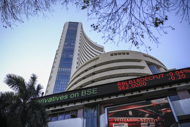 © Bloomberg. An electronic ticker board displays stock figures outside the Bombay Stock Exchange (BSE) building in Mumbai, India, on Tuesday, Dec. 11, 2018. India’s new central bank governor has a list of challenges to face as he takes office: from fixing a banking crisis to convincing investors of the institution’s autonomy. 