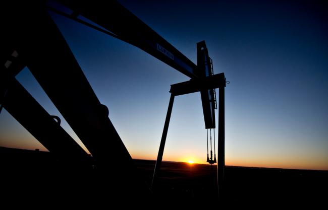 © Bloomberg. A Lufkin Industries Inc. Mark II Unitorque electric pumping unit removes crude oil from a Fidelity Exploration & Production Co. well outside South Heart, North Dakota, U.S. Photographer: Daniel Acker/Bloomberg