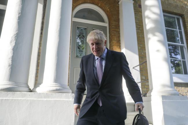 © Bloomberg. Boris Johnson, former U.K. foreign secretary and U.K. Conservative party leadership candidate, leaves his home in London, U.K., on Tuesday, June 18, 2019.  Photographer: Simon Dawson/Bloomberg