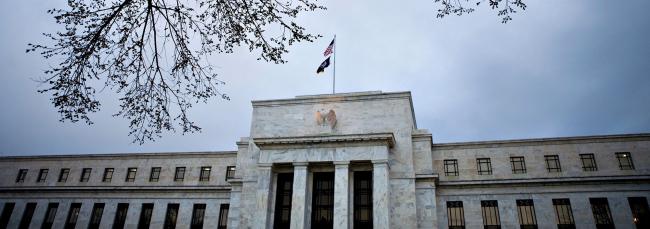 © Bloomberg. The U.S. Federal Reserve building stands in Washington D.C. Photographer: Brendan Smialowski/Bloomberg