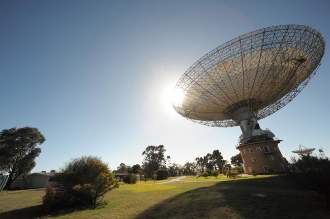 © Bloomberg. The Parkes Observatory radio telescope operated by CSIRO) in Parkes, New South Wales, Australia. Photographer: Carla Gottgens/Bloomberg