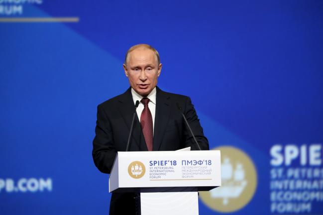 © Bloomberg. Vladimir Putin, Russia's president, speaks at the plenary session during the St. Petersburg International Economic Forum (SPIEF) in St. Petersburg, Russia, on Friday, May 25, 2018. 