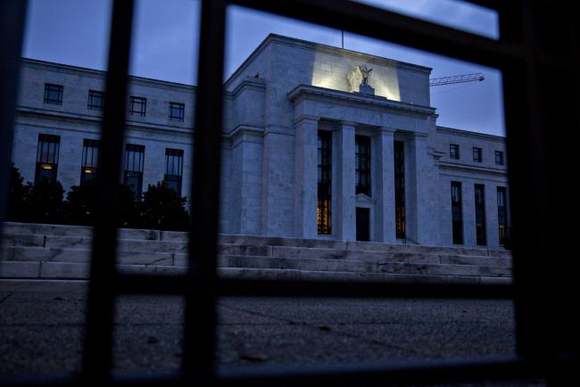 © Bloomberg. The Marriner S. Eccles Federal Reserve building stands in Washington, D.C., U.S., on Monday, Aug. 13, 2018. Federal Reserve officials left U.S. interest rates unchanged in August and stuck with a plan to gradually lift borrowing costs amid strong growth that backs bets for a hike in September. Photographer: Andrew Harrer/Bloomberg